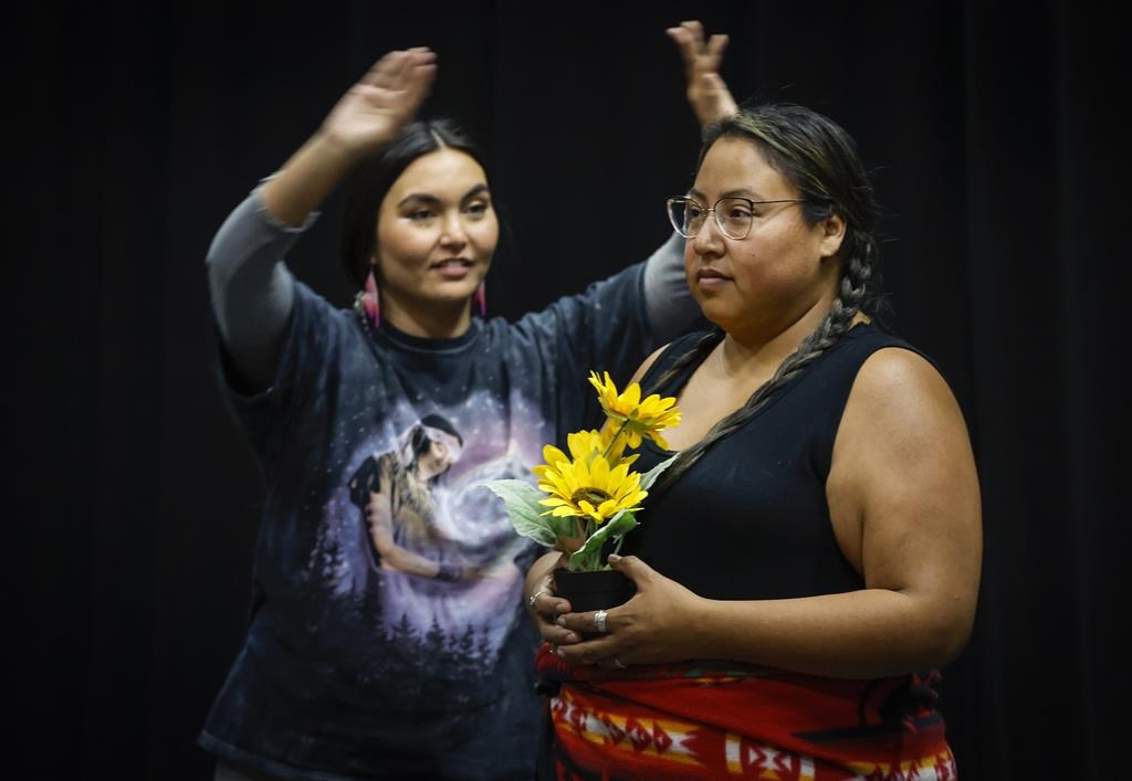 Actors Mary Rose Cohen, left, and Janine Owlchild rehearse for the play O'Kosi in Calgary, Alta., Friday, Sept. 16, 2022.