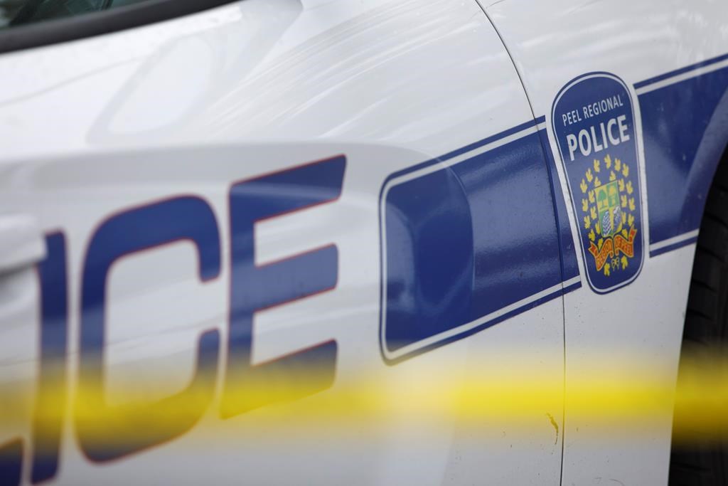 A Peel Regional Police logo is shown on a police vehicle in Brampton, Ont., Thursday, Nov. 7, 2019. THE CANADIAN PRESS/Cole Burston.