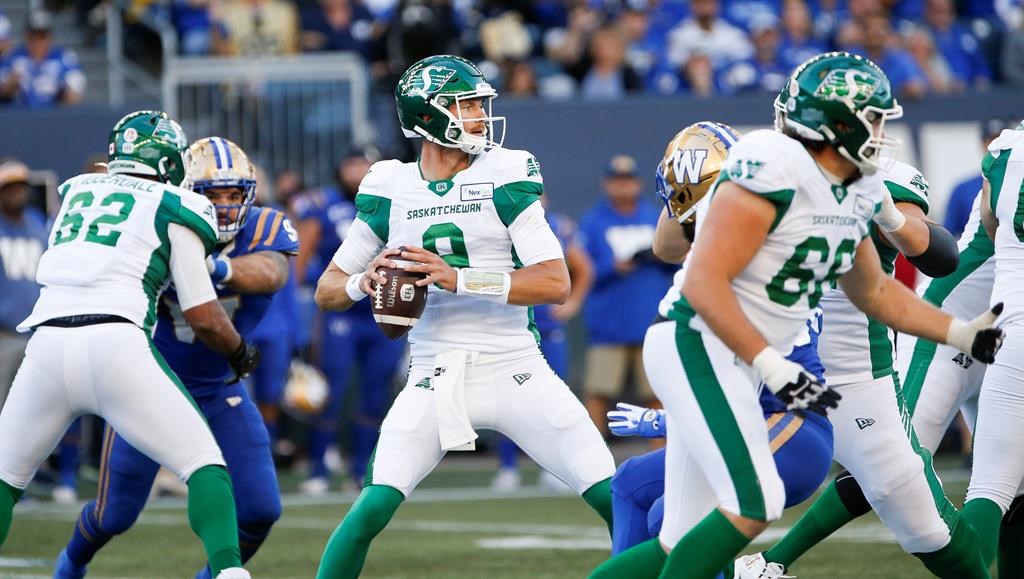 Saskatchewan Roughriders quarterback Jake Dolegala (9) throws against the Winnipeg Blue Bombers during the second half of CFL football action in Winnipeg Saturday, Sept. 10, 2022. The Saskatchewan Roughriders suspended Dolegala for one game Monday after he was arrested and charged with impaired driving. THE CANADIAN PRESS/John Woods.