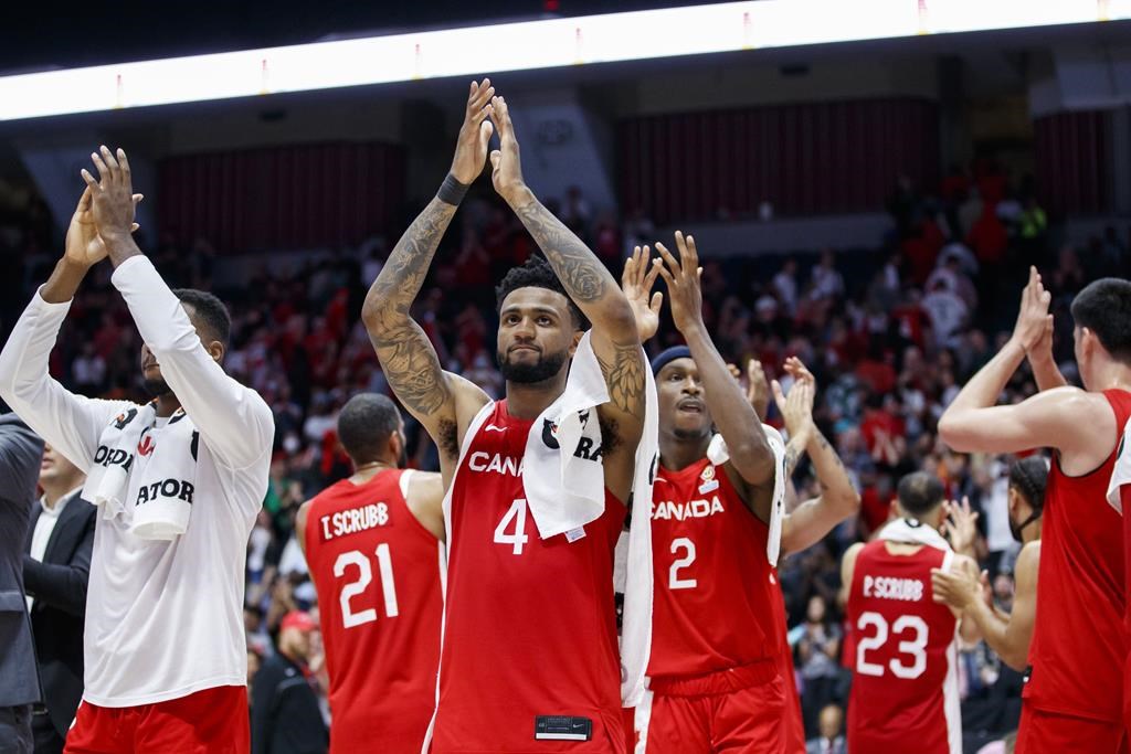 Nickeil Alexander-Walker (4) and teammates applaud the crowd after their FIBA international men's World Cup basketball qualifying game victory over Dominican Republic, in Hamilton, Ont., Friday, July 1, 2022. Edmonton is set to host Canada's next two FIBA World Cup qualifying home games in November.
