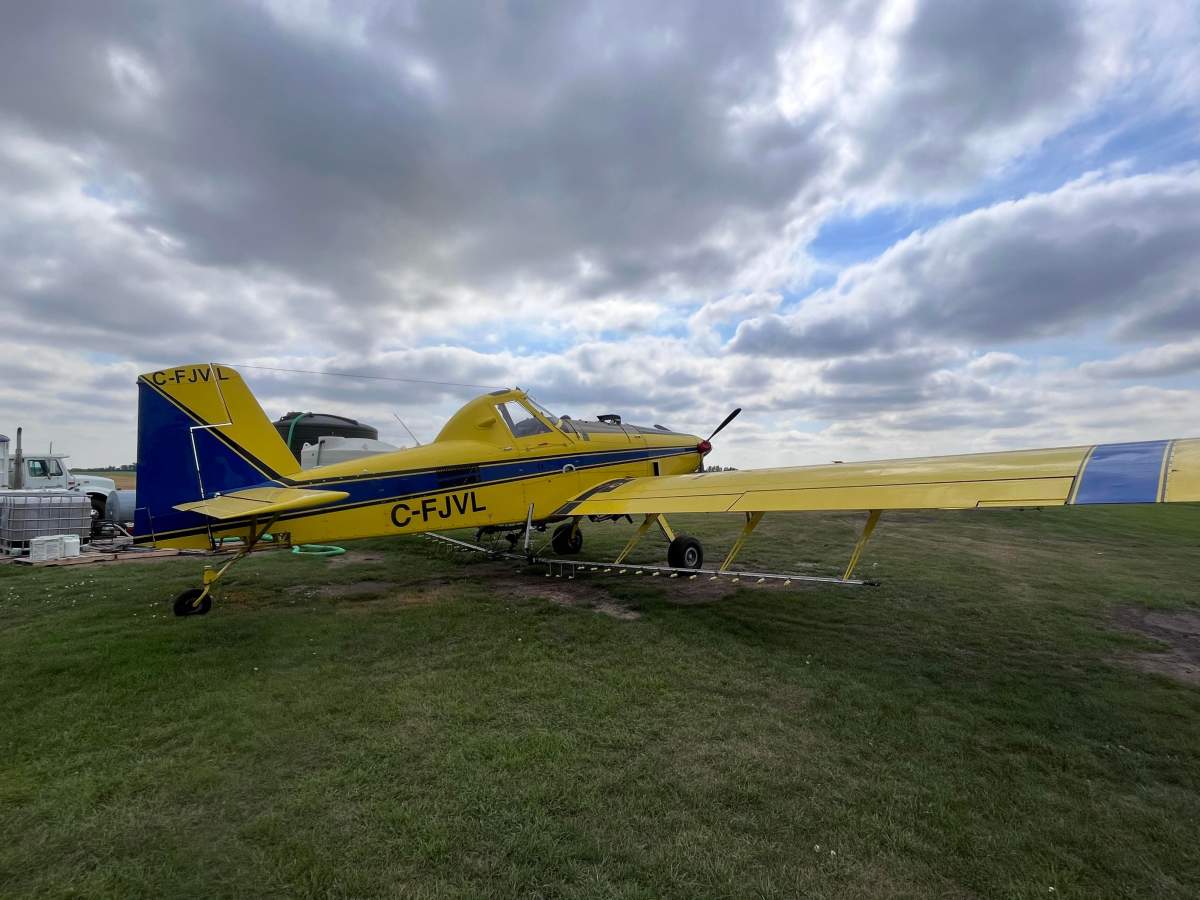 An Air Tractor 502B crop duster plane with tail number C-FJVL, pictured in central Alberta in August 2022, a few weeks before it crashed on a road near Donalda, Alta. on Sept. 12, 2022.