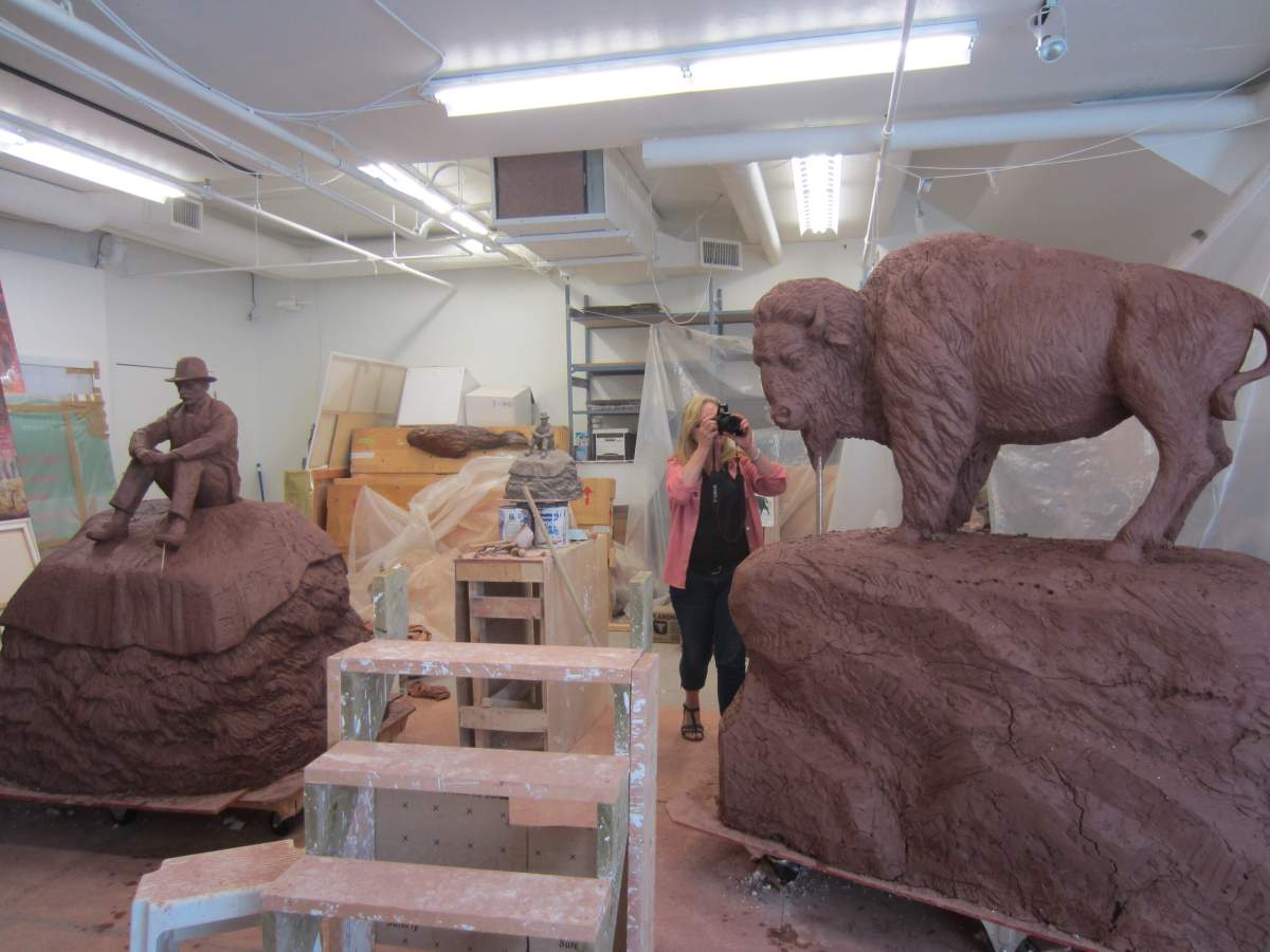 The Buffalo and the Buffalo Fur Trader by artist Kenneth Lum are two, 13-foot-tall bronze sculptures commissioned for the Walterdale Bridge replacement in Edmonton, Alta.