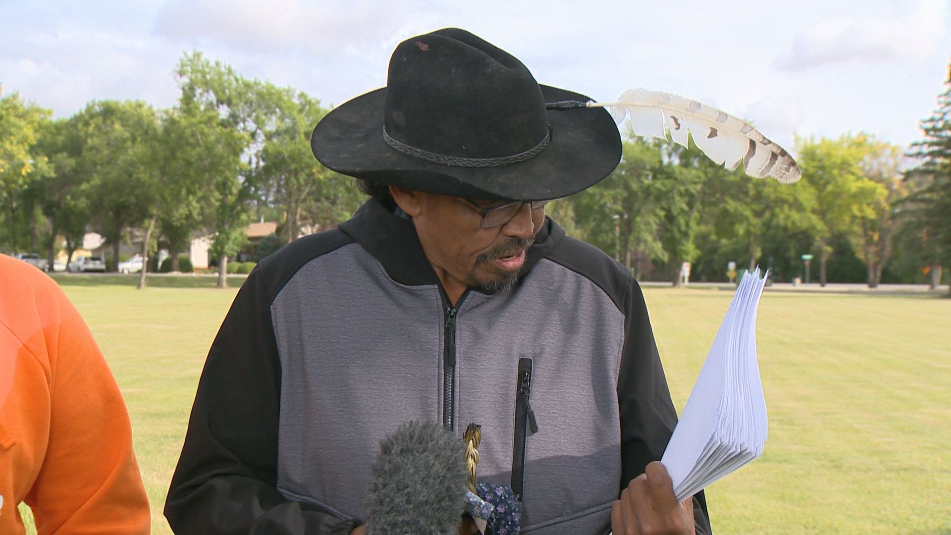 Brian ‘Buggy’ Burns examines the extensive criminal file of Myles Sanderson, suspected of killing Burns’ wife and son in a mass stabbing on Sept. 4.