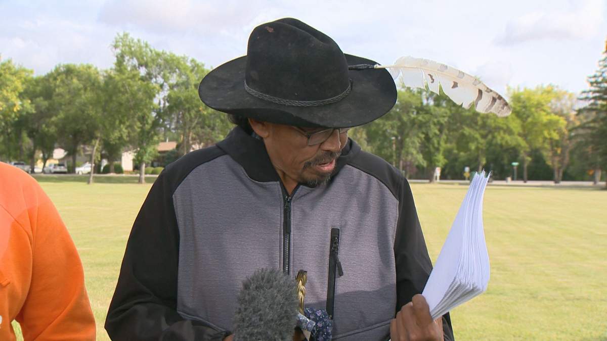 Brian ‘Buggy’ Burns examines the extensive criminal file of Myles Sanderson, suspected of killing Burns’ wife and son in a mass stabbing on Sept. 4.