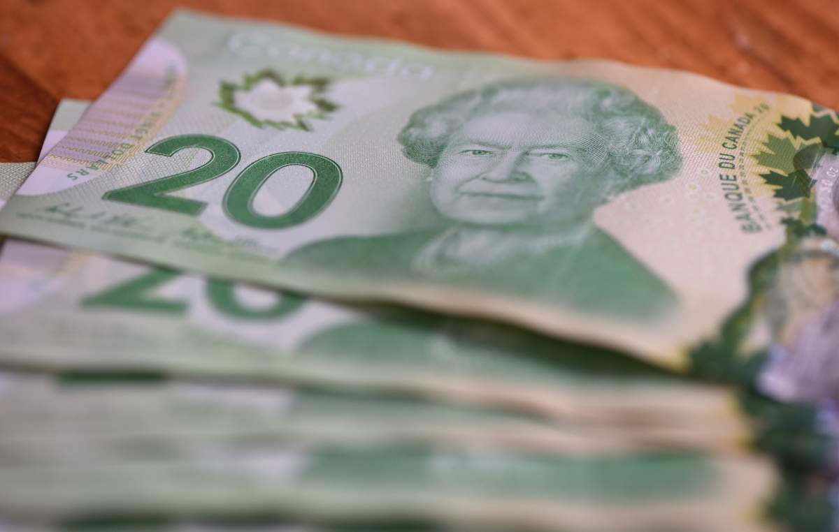 A file photo of Canadian $20 bills.