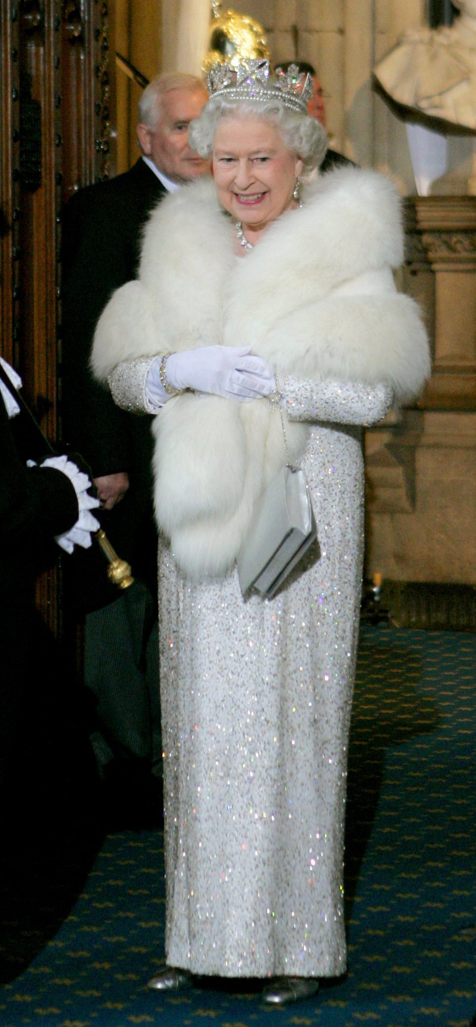 Queen Elizabeth II leaves the Palace of Westminster in London after delivering her speech at the State Opening of Parliament, Wednesday Nov. 15, 2006.