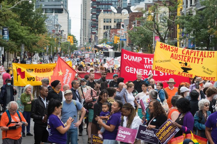 Union members and activist take part in the Labour Day Parade in Toronto, on Monday, September 5, 2022.  