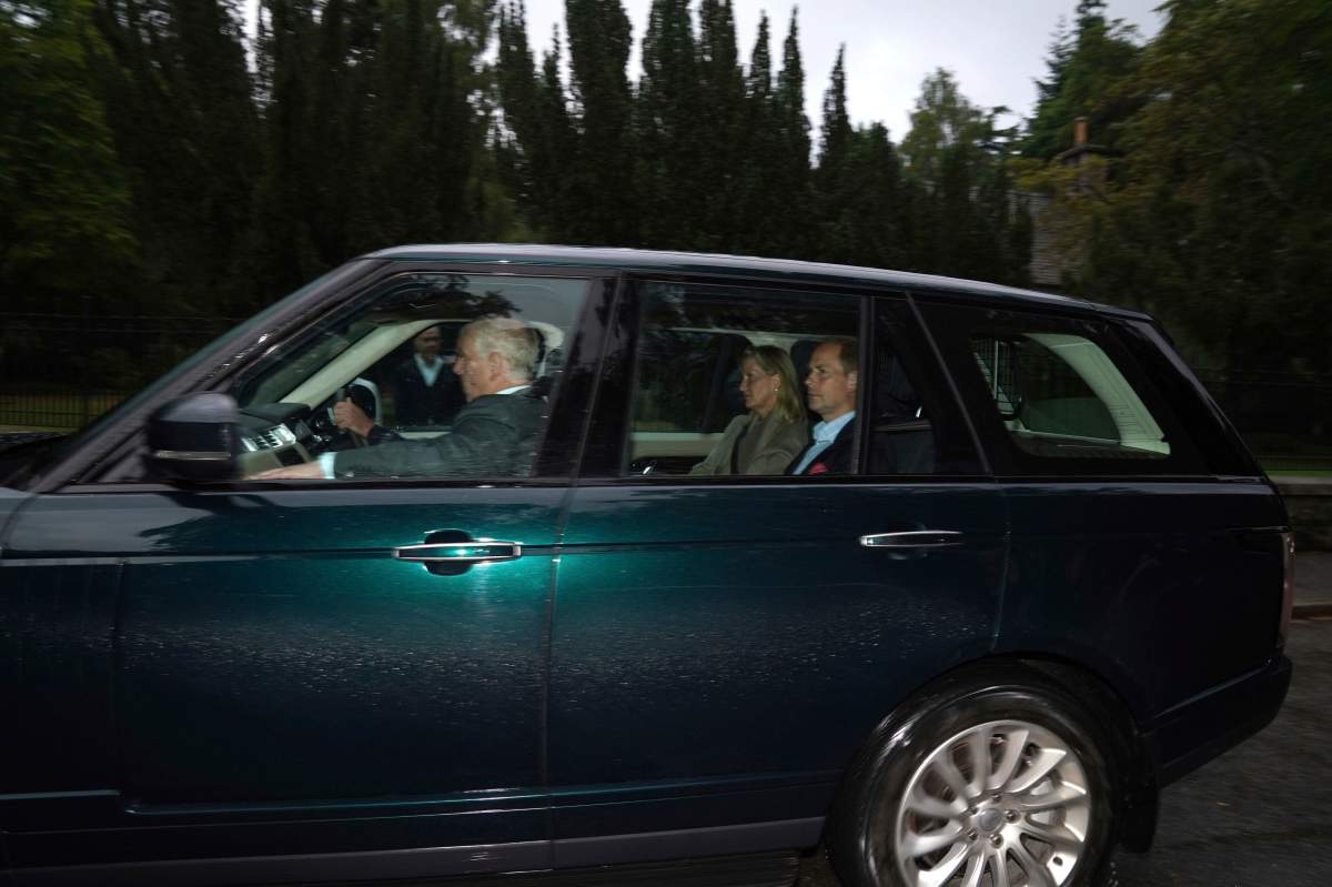 Britain’s Prince William drives a car carrying the Prince Andrew, and Prince Edward and Sophie, Countess of Wessex into Balmoral in Scotland, Thursday, Sept. 8, 2022. (Andrew Milligan/PA via AP)