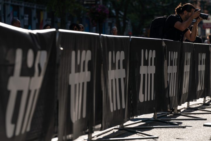 A photographer takes a photo at the Toronto International Film Festival's kick off event in Toronto on Thursday, September 8, 2022.