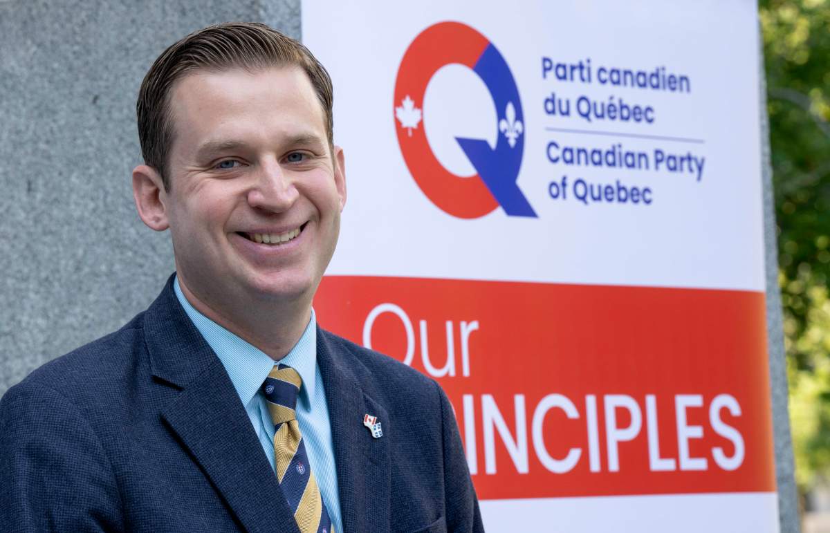 Colin Standish of the Canadian Party of Quebec smiles during a news conference in Montreal, on Thursday, September 8, 2022. THE CANADIAN PRESS/Paul Chiasson