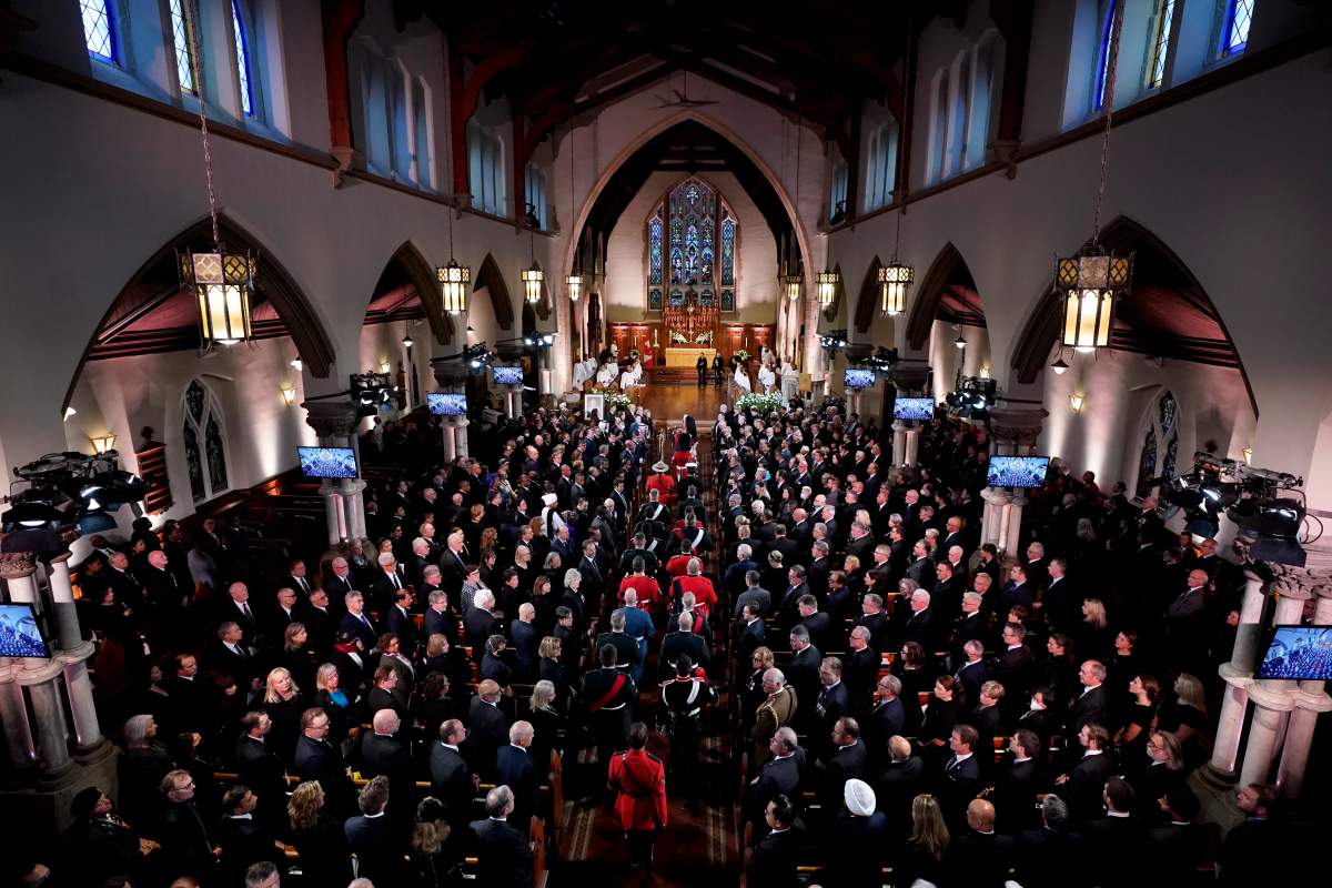 A procession arrives into the chapel during commemorative ceremonies for Queen Elizabeth at Christ Church Cathedral, in Ottawa, Monday, Sept.19, 2022. THE CANADIAN PRESS/Adrian Wyld