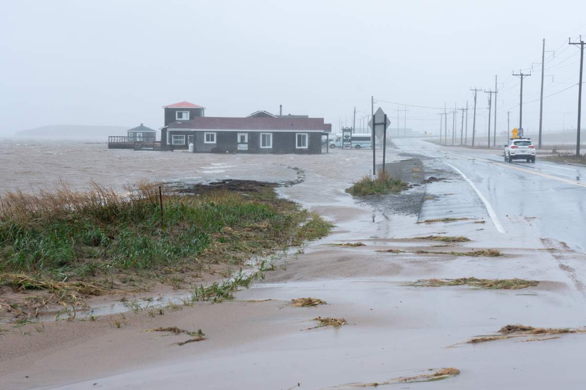 Youth hostel Paradis Bleu is surrounded by high water caused by post-tropical storm Fiona is shown on the Les Îles-de-la-Madeleine, Que., Saturday, Sept. 24, 2022. Coastal flooding remains a threat for parts of Nova Scotia, Prince Edward Island including the Northumberland Strait, the Gulf of St. Lawrence region including Iles-de-la-Madeleine and eastern New Brunswick, southwest Newfoundland, the St. Lawrence Estuary and the Quebec Lower North Shore. THE CANADIAN PRESS/Nigel Quinn