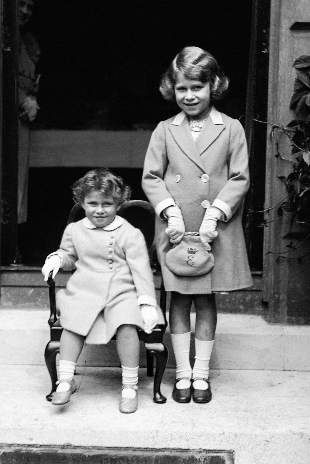 Princess Margaret (seated) with her sister Princess Elizabeth in 1933.