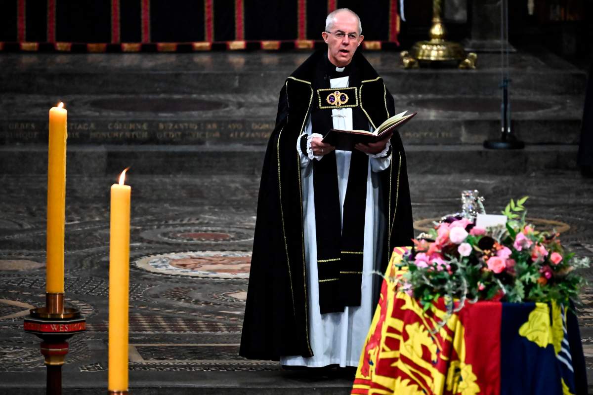 The Archbishop of Canterbury Justin Welby gives a reading at the funeral of Queen Elizabeth II in Westminster Abbey in central London, Monday Sept. 19, 2022. (Ben Stansall/Pool via AP)