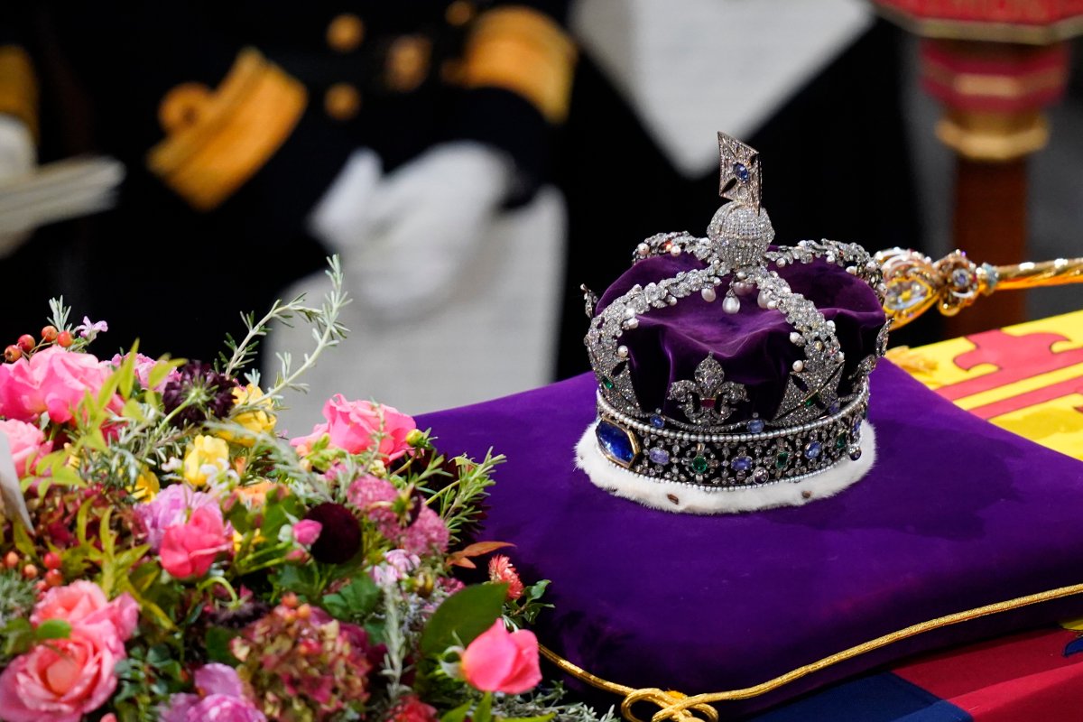 The coffin of Queen Elizabeth II, draped in the Royal Standard with the Imperial State Crown and the Sovereign's sceptre, during the State Funeral of Queen Elizabeth II, held at Westminster Abbey, London, Monday, Sept. 19, 2022.