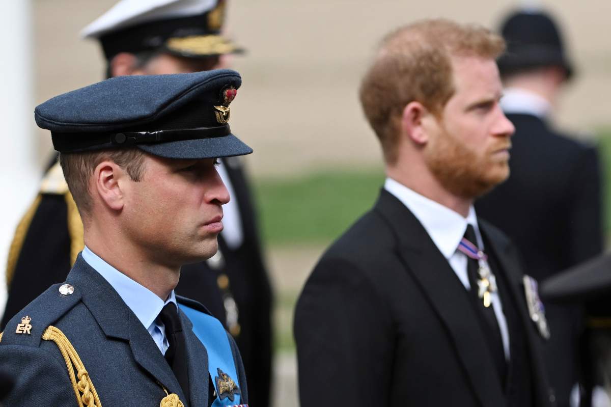 Prince William, Prince of Wales, left, and Prince Harry, Duke of Sussex, follow the procession for the state funeral of Queen Elizabeth II Monday, Sept. 19, 2022.  (Jeff Spicer/Pool Photo via AP)