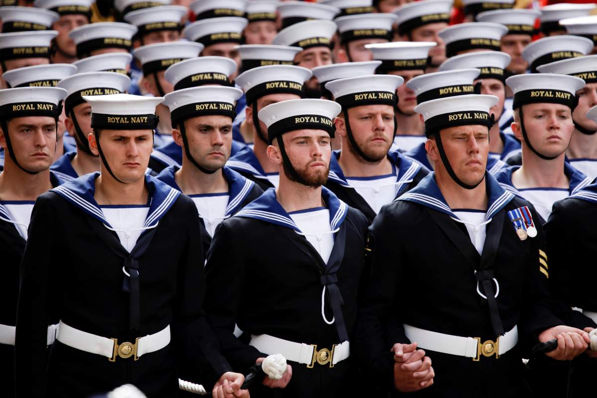 Members of the Royal Navy participate in the funeral procession of Queen Elizabeth II, in London, Sept. 19, 2022. (Alkis Konstantinidis/Pool Photo via AP)
