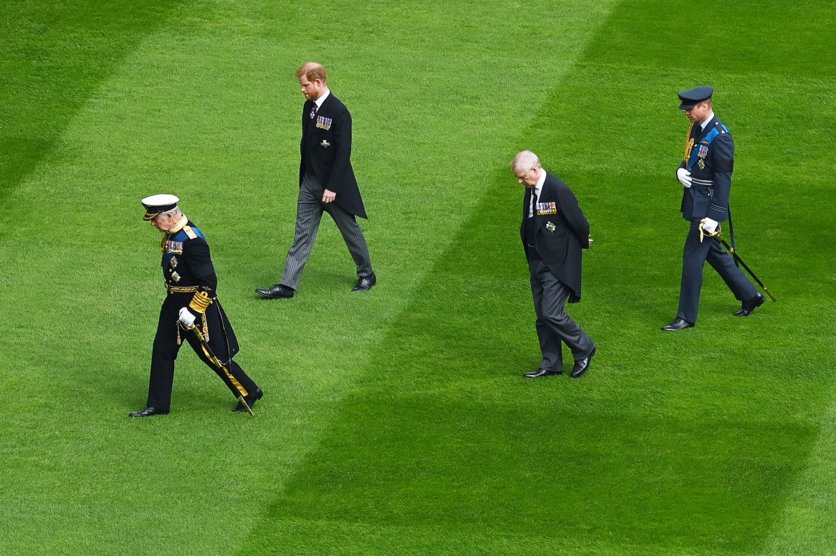 Left to right, Britain's King Charles III, Britain's Prince Harry, Britain's Prince Andrew and Britain's Prince William join the procession following the coffin of Queen Elizabeth II, aboard the State Hearse, ahead of the Committal Service for Britain's Queen Elizabeth II, in the Quadrangle inside Windsor Castle, Monday, Sept. 19, 2022.