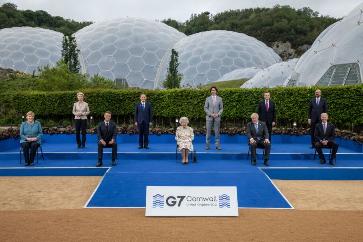 German Chancellor Angela Merkel, European Commission Ursula von der Leyen, French President Emmanuel Macron, Japanese Prime Minister Yoshihide Suga, Queen Elizabeth II, Canadian Prime Minister Justin Trudeau, British Prime Minister Boris Johnson, Italian Prime Minister Mario Draghi, President of the European Council Charles Michel and United States President Joe Biden pose for a group photo at a drinks reception for Queen Elizabeth II and G7 leaders at The Eden Project during the G7 Summit on June 11, 2021, in St Austell, Cornwall, England.