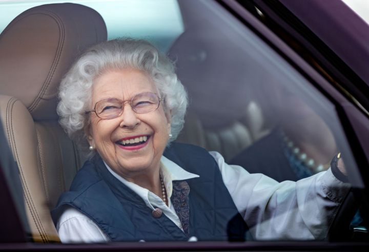 Queen Elizabeth II drives her Range Rover car as she attends day two of the Royal Windsor Horse Show in Home Park, Windsor Castle, on July 2, 2021, in Windsor, England.