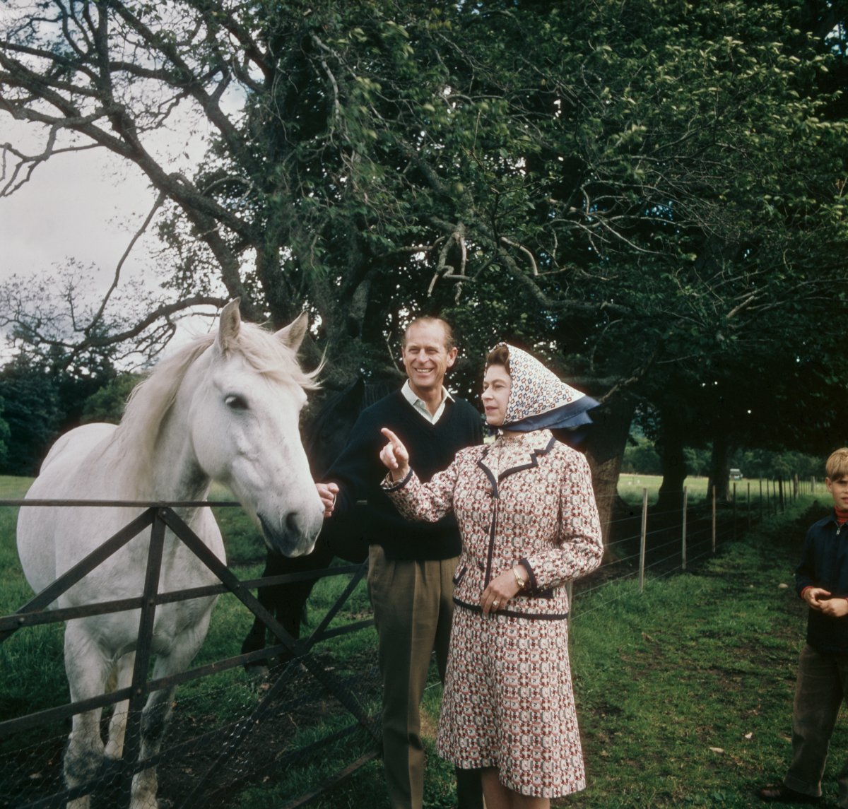 Queen Elizabeth II and Prince Philip visit a farm on the Balmoral estate in Scotland, during their Silver Wedding anniversary year, September 1972.