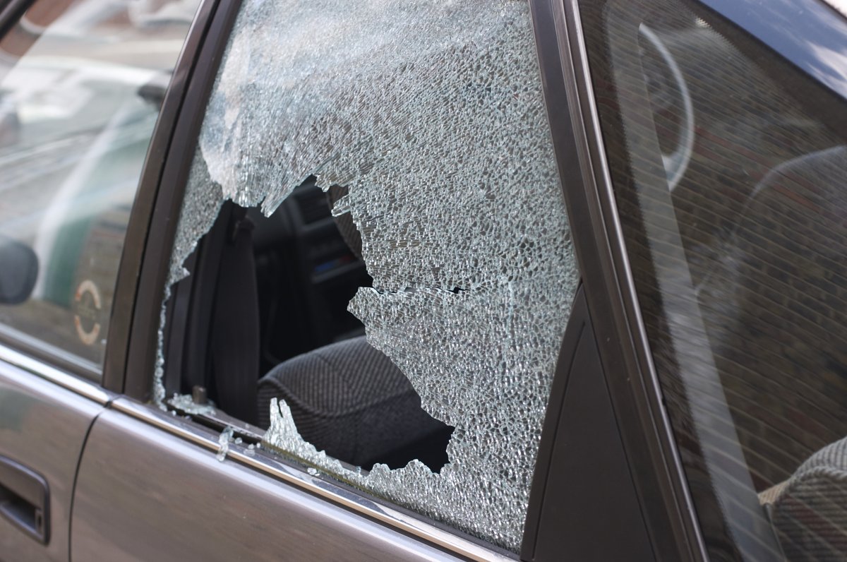 Stock photo of a window smashed in a vehicle. 