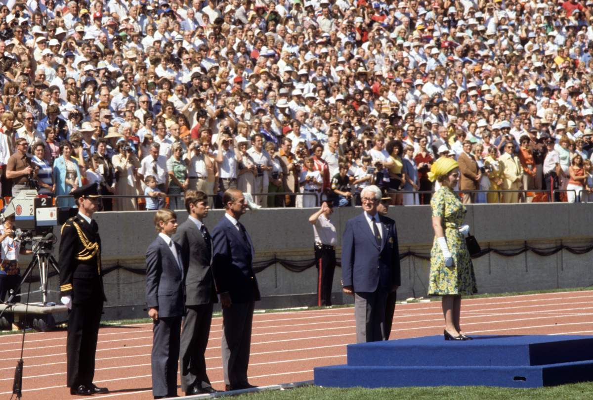 EDMONTON, CANADA – AUGUST 03 : Queen Elizabeth ll, watched by Prince Philip, Duke of Edinburgh, Prince Andrew and Prince Edward, opens the Commonwealth Games on August 03, 1978 in Edmonton, Canada. (Photo by Anwar Hussein/Getty Images)
