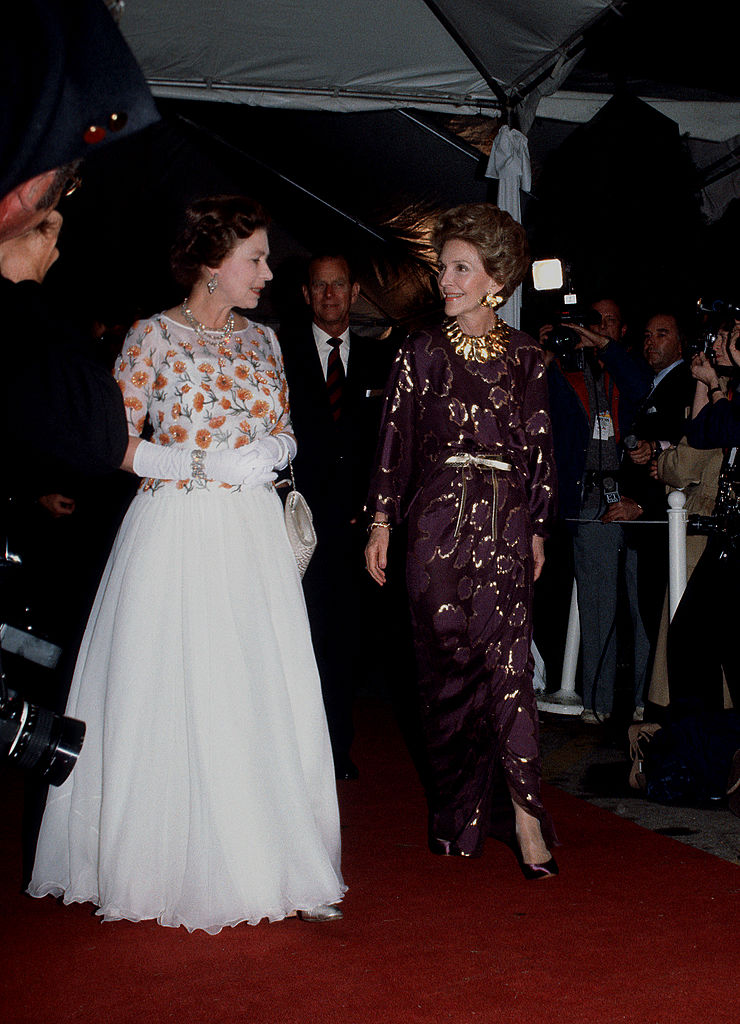 Queen Elizabeth ll and Nancy Reagan arrive for a concert during an official tour of the U.S.A. on February 28, 1983 in Long Beach, USA.