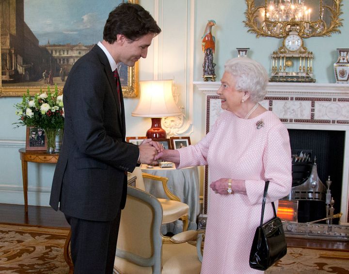 Prime Minister of Canada Justin Trudeau shake hands with Queen Elizabeth II during a private audience at Buckingham Palace on November 25, 2015, in London, England. It was Trudeau's first visit to Britain as Canada's prime minister.