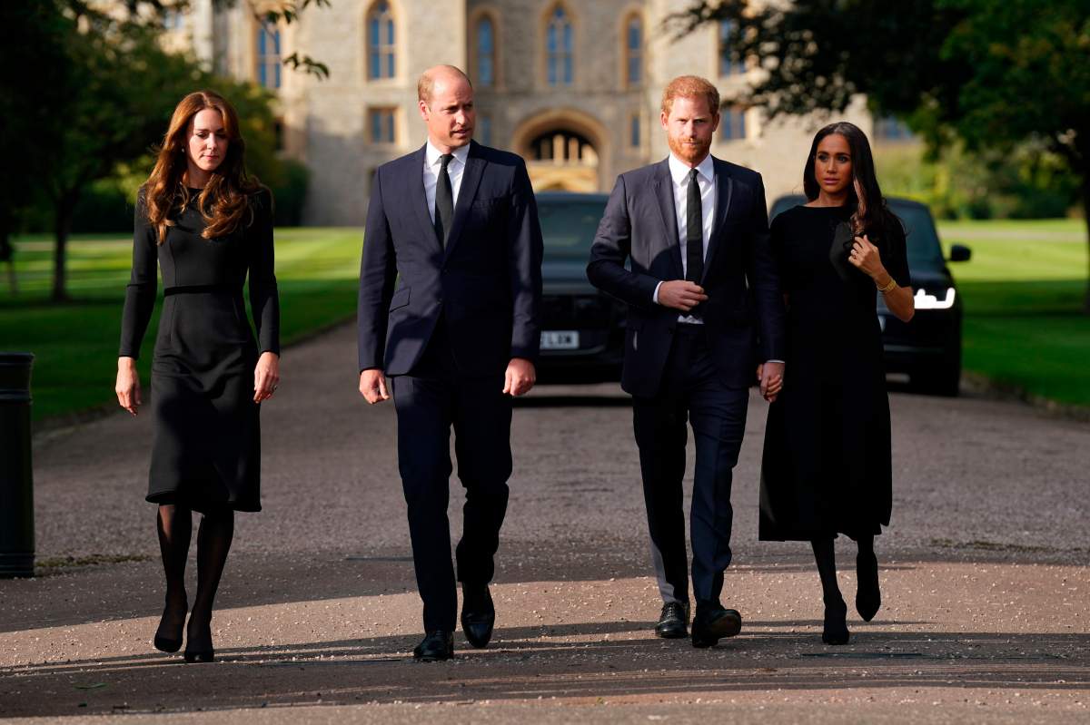 From left, Kate, the Princess of Wales, Prince William, Prince of Wales, Prince Harry and Meghan, Duchess of Sussex walk to meet members of the public at Windsor Castle, following the death of Queen Elizabeth II on Thursday, in Windsor, England, Saturday, Sept. 10, 2022.