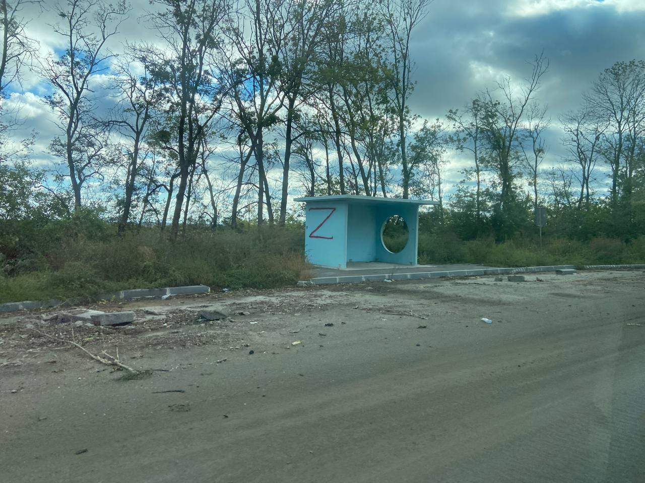Bus shelter tagged by Russian forces with their Z logo near Izyum, Ukraine.