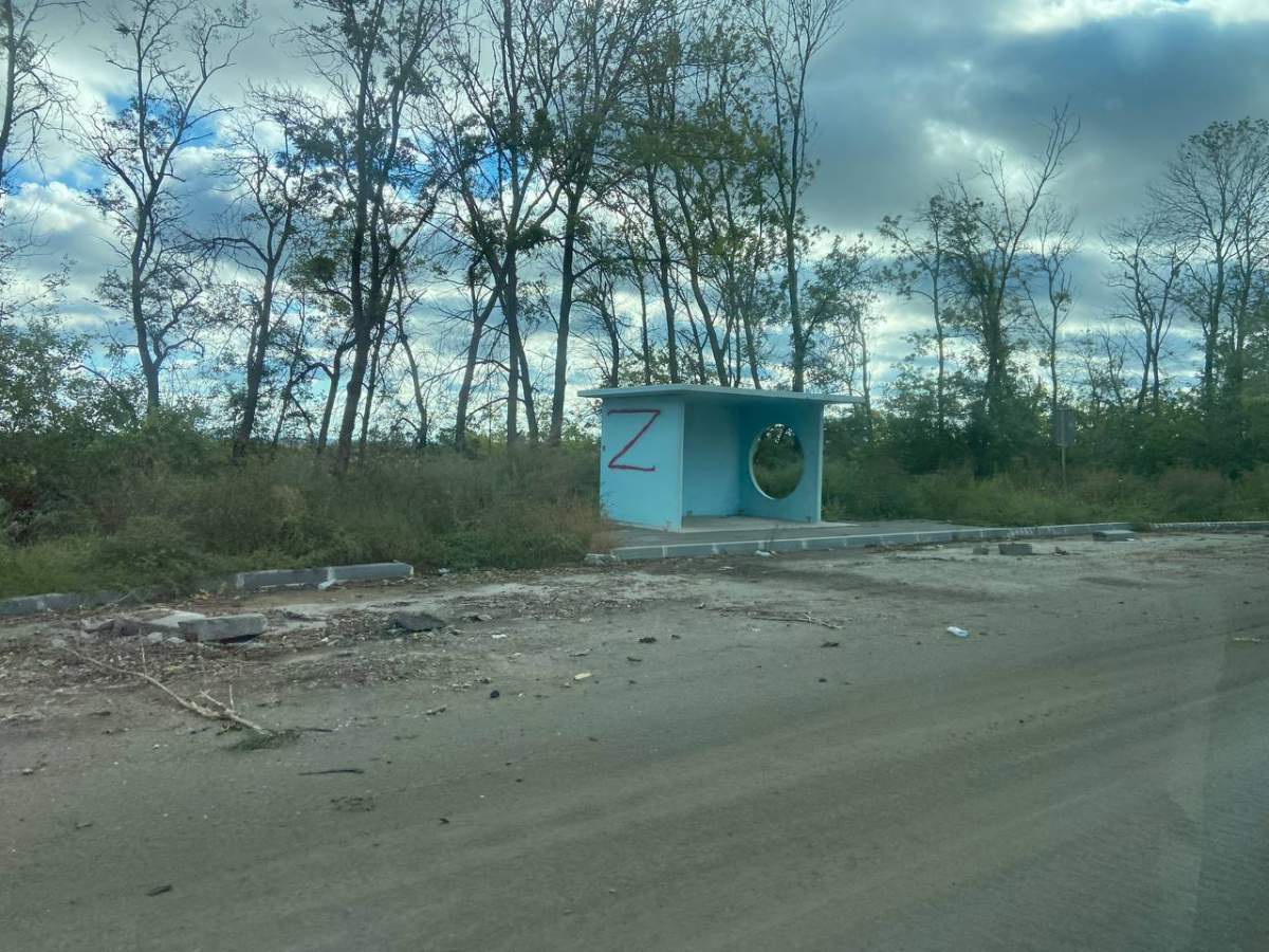 Bus shelter tagged by Russian forces with their Z logo near Izyum, Ukraine.