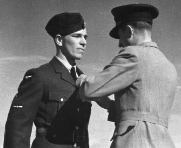 A photo of young Jim Ashworth receiving his wings in 1941.