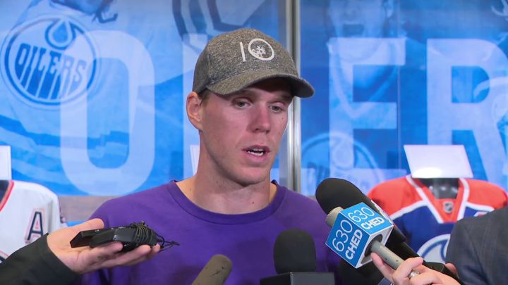Oilers captain Connor McDavid speaks to reporters in Edmonton on Sept. 12, 2022.