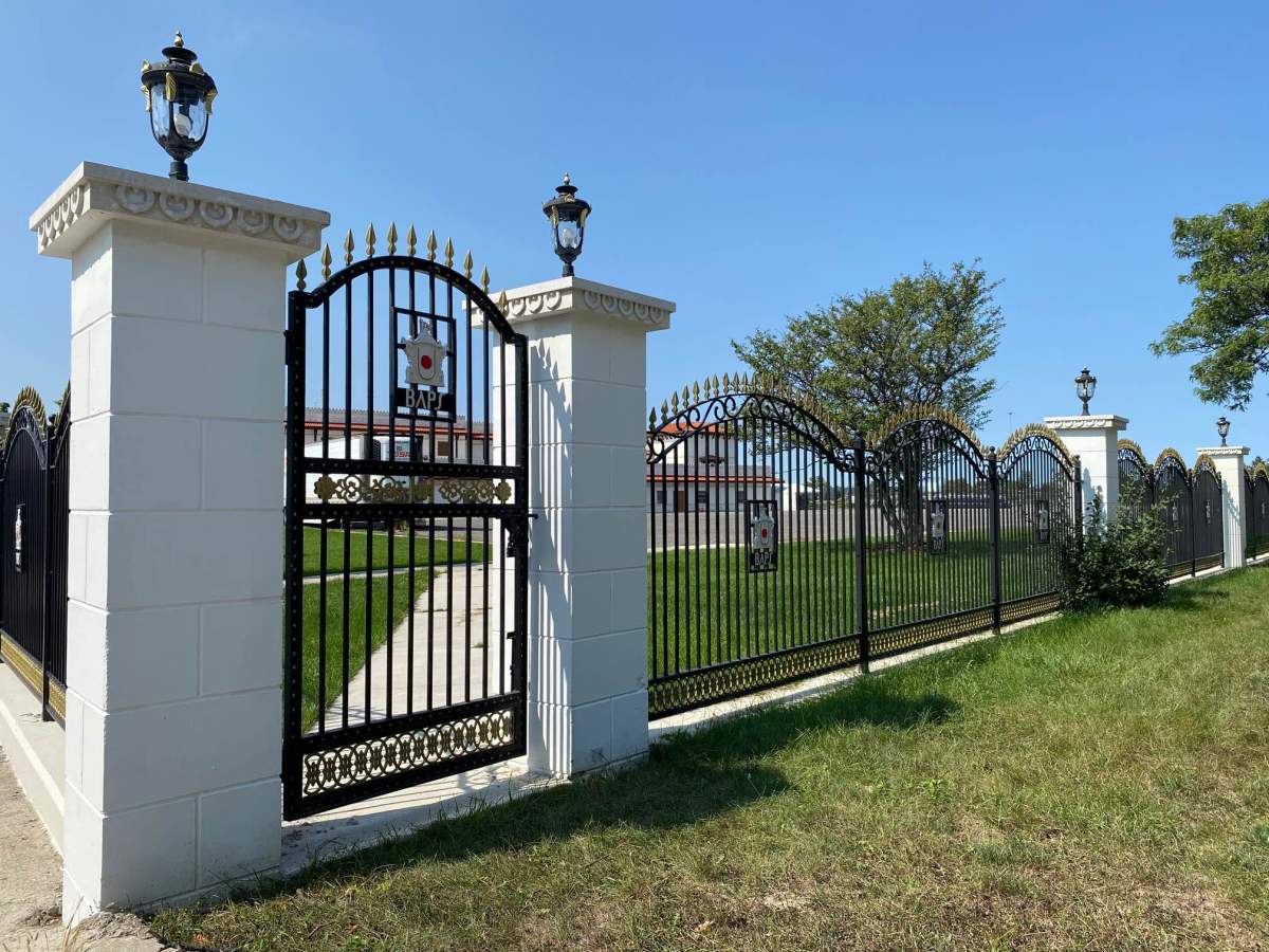 By Thursday morning the graffiti had been cleaned, and fresh paint had been applied to the gate. 