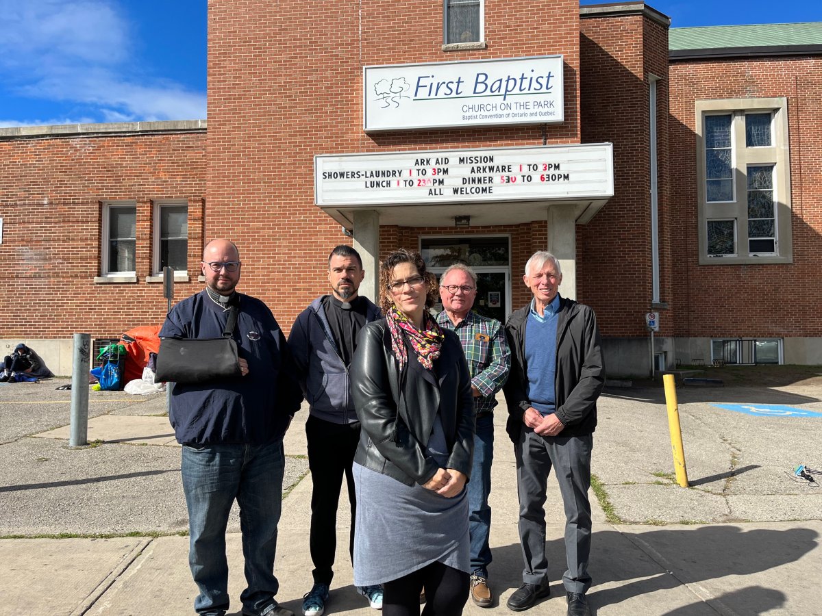 (from left to right): Rev. Kevin George of St. Aidan's Anglican Church, Pastor Joshua Lawrence of First St. Andrew's United Church, Ark Aid Street Mission executive director Sarah Campbell, Rev. Al Roberts of First Baptist Church and Ed Wilson, chair of Ark Aid's board of directors.