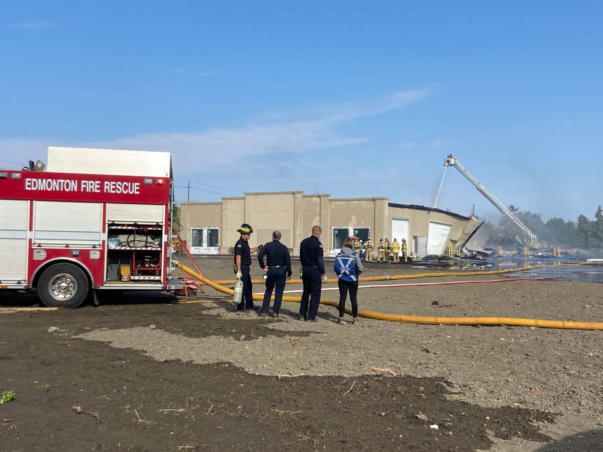 Fire crews battle blaze at a building in the area of 95 Avenue and 49 Street Monday, Sept. 12, 2022.