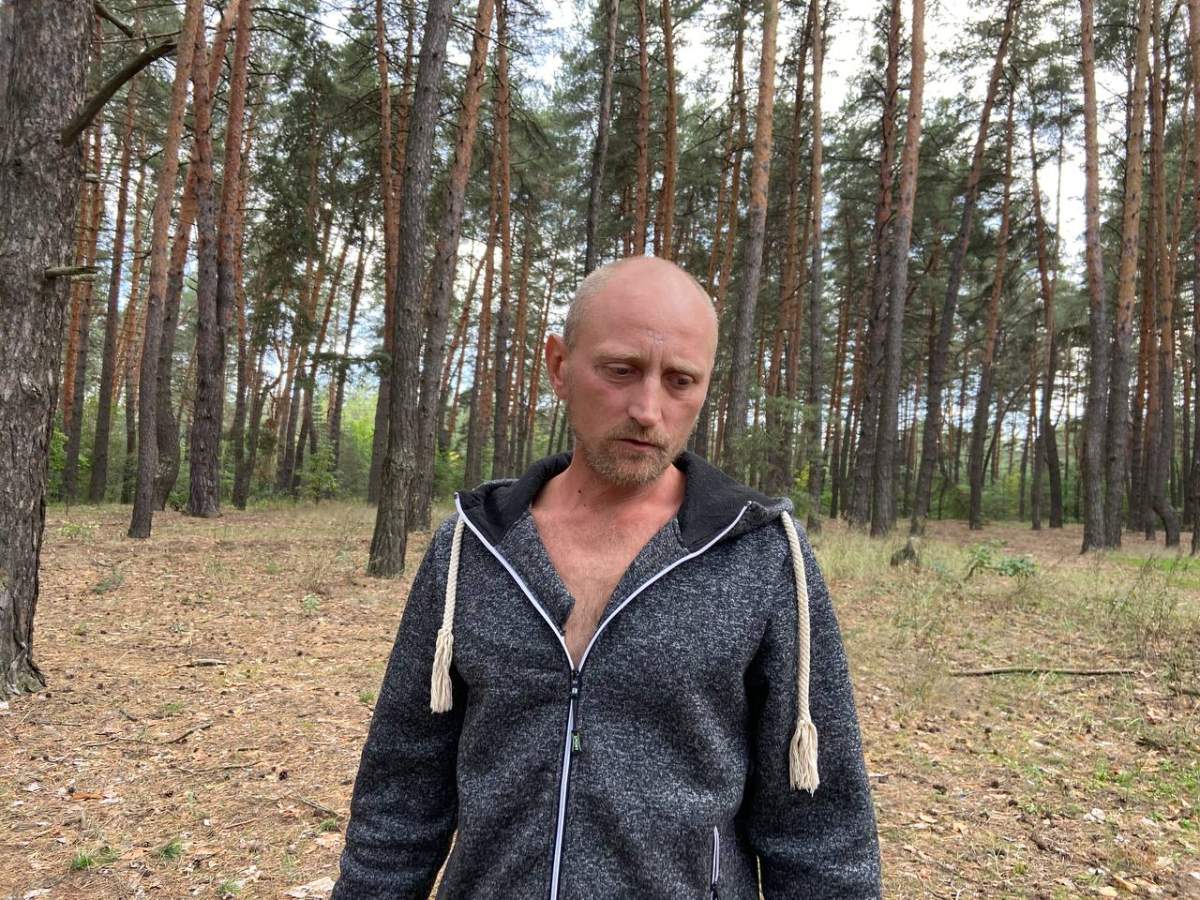 Oleksii Sukhorebryi shows reporter site where nephew was killed by Russians in Dibrova, Ukraine.