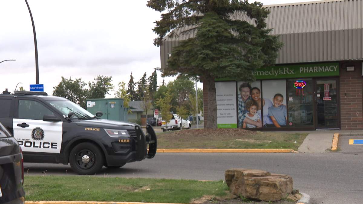 Calgary police attend the scene of a pharmacy robbery in northeast Calgary on Sept. 19, 2022.