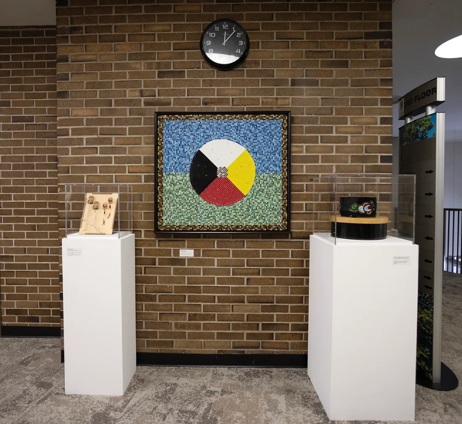 The Indignous art display at London, Ont., city hall features (left to right) Giizhik Medicine Earrings created by Chandra Nolan, The Medicine Wheel created by Brenda Collins, and a Traditional Métis Ceremonial Smoking Hat by Annette Sullivan.