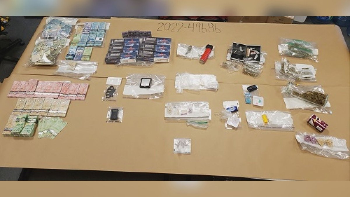 Surrey RCMP seized large amounts of illicit drugs and cash from a business.