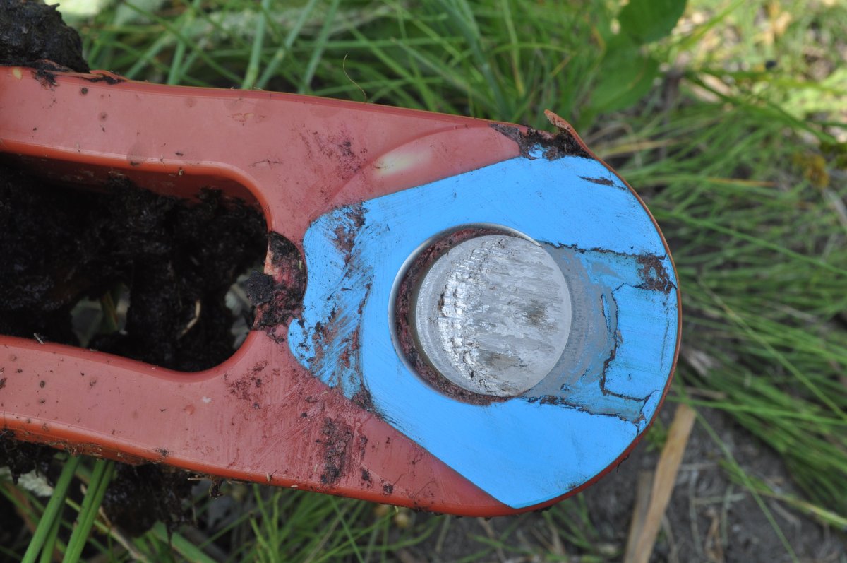 The sheared-off pin that failed on the Yellowhead Helicopters Bell Textron 212 helicopter that crashed near Evansburg, Alta. on June 28, 2021.