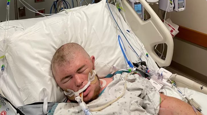 A photo shared to a GoFundMe page shows Austin Bellamy in hospital after he was stung approximately 20,000 times by bees.
