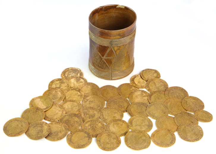 More than 260 coins were found in a cup no bigger than a can of pop.
