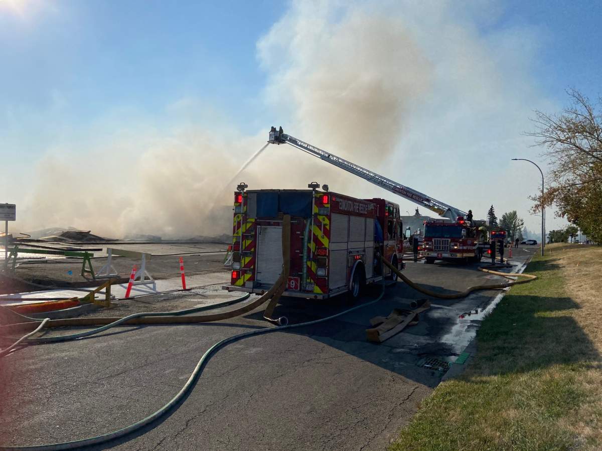 Fire crews battle blaze at a building in the area of 95 Avenue and 49 Street Monday, Sept. 12, 2022.