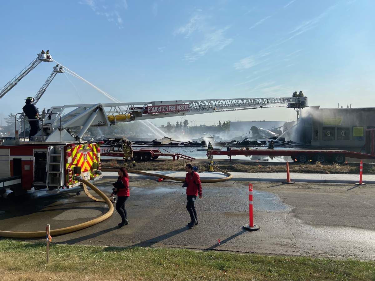 Fire crews battle blaze at a building in the area of 95 Avenue and 49 Street Monday, Sept. 12, 2022.