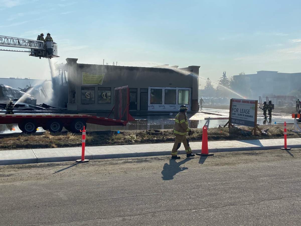 Fire crews battle blaze at a building in the area of 95 Avenue and 49 Street Monday, Sept. 12, 2022.
