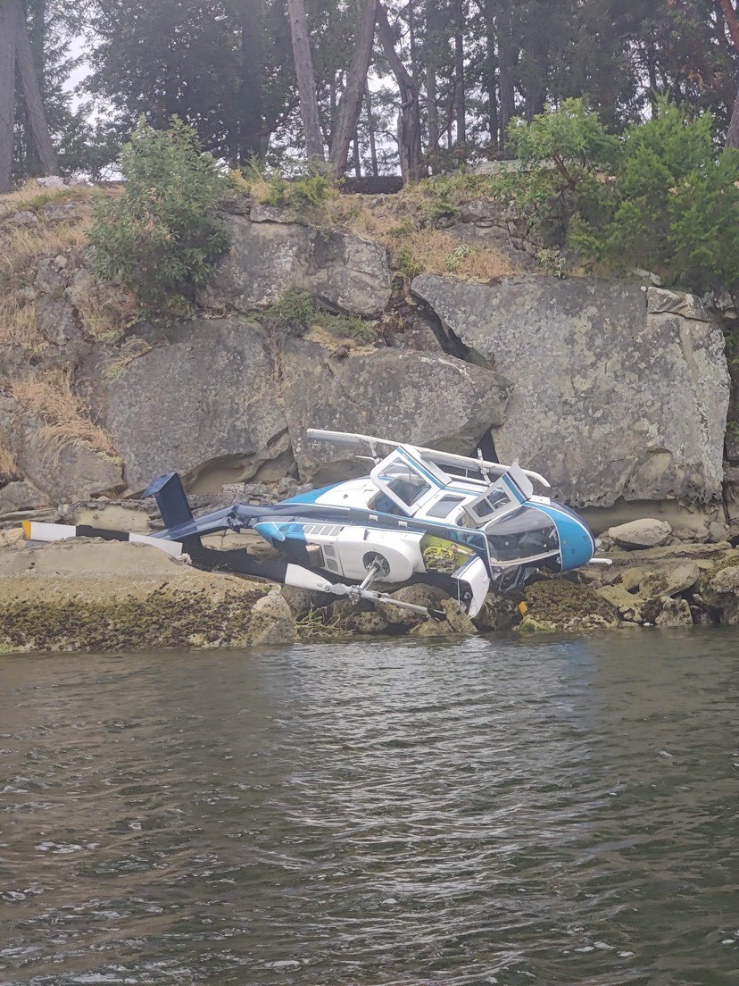 The helicopter pictured on its side near Galiano Island.