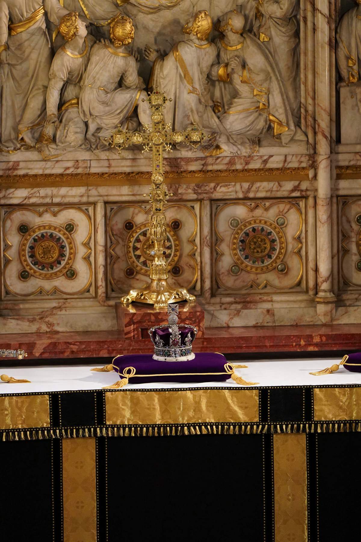 The Imperial State Crown rests on the high altar after being removed from the coffin of Britain’s Queen Elizabeth II during a committal service at St George’s Chapel, Windsor Castle, in Windsor, England, Monday, Sept. 19, 2022. (Joe Giddens/Pool Photo via AP)