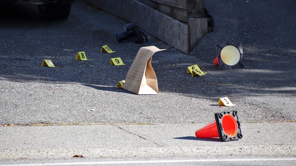 Evidence markers were seen on the property in Surrey.